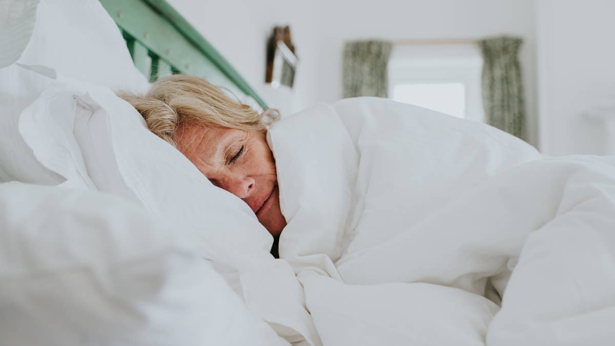 Here's Exactly How Much Sleep To Get Each Night if You're Over 60, According to Experts