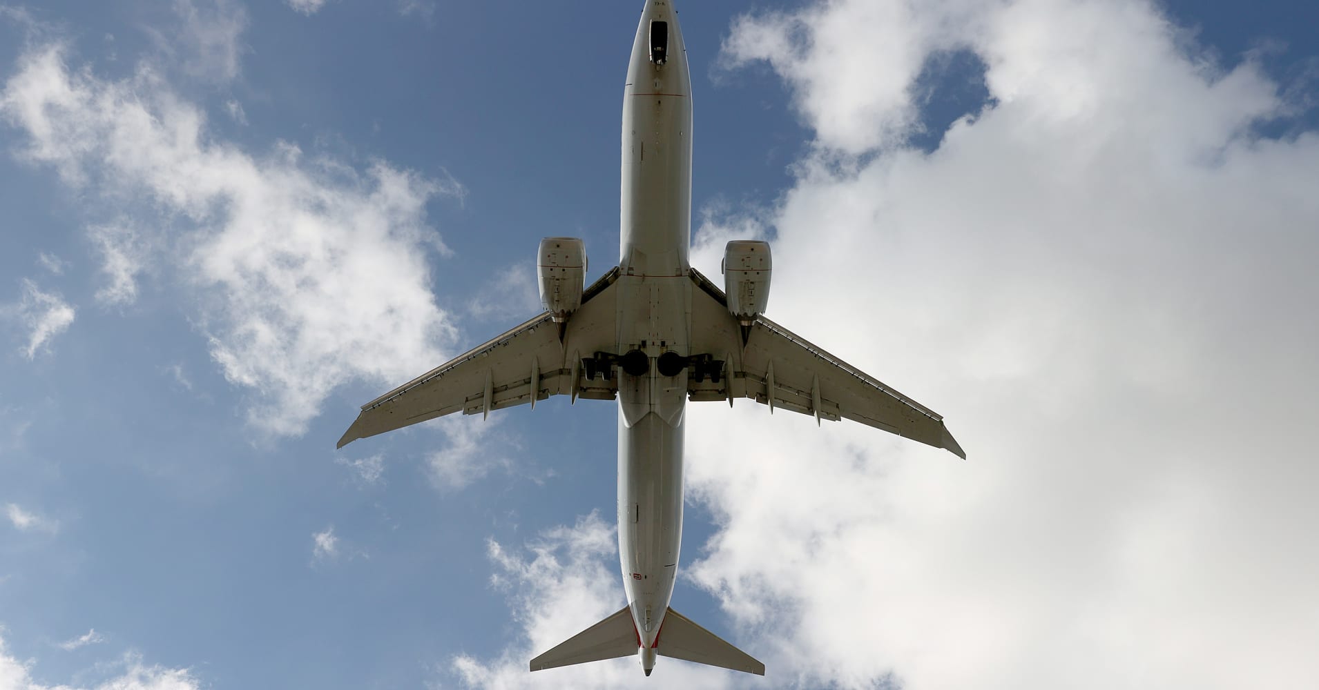 An American Airlines Boeing 787-9 Dreamliner approaches for a landing at the Miami International Airport on December 10, 2021 in Miami, Florida.