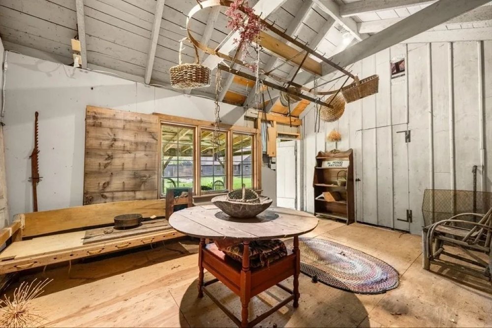 Interior of historic barn at 1678 William Haskell House in Gloucester, MA, on sale for $1,250,000