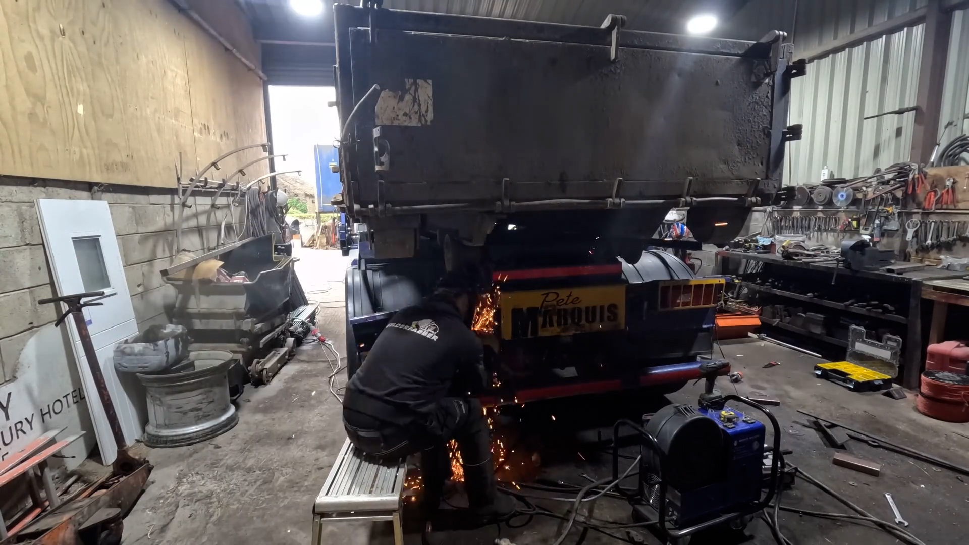 Heavy dump truck chassis repair underway