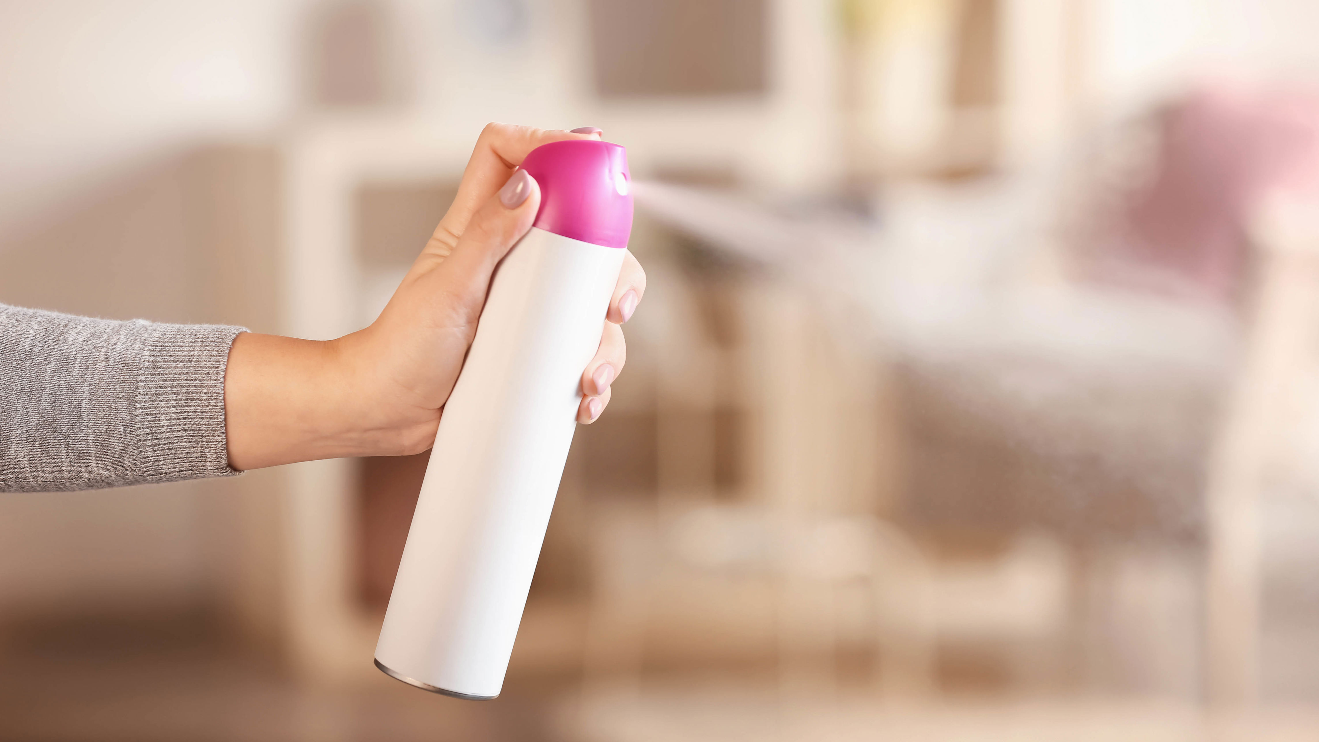 Air freshener being sprayed