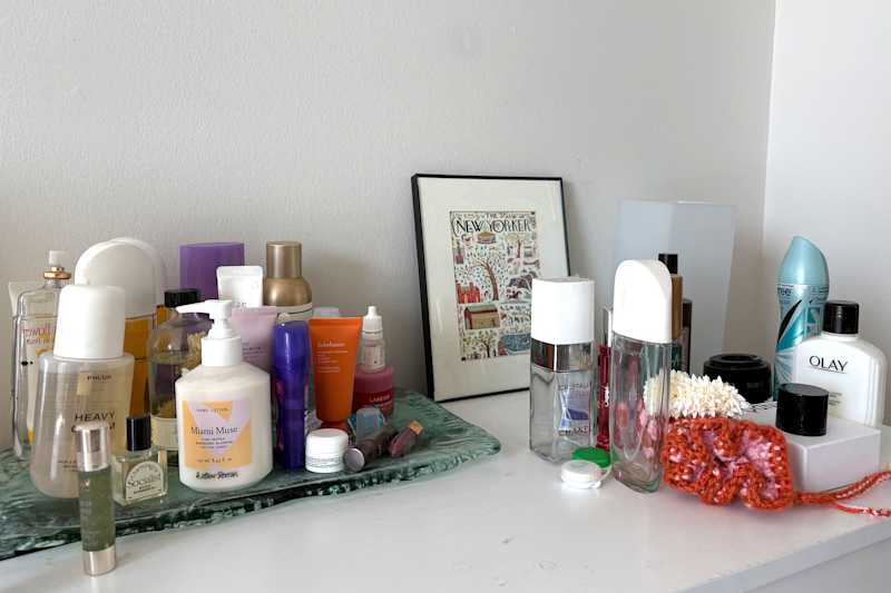 Toiletries organized on dresser.