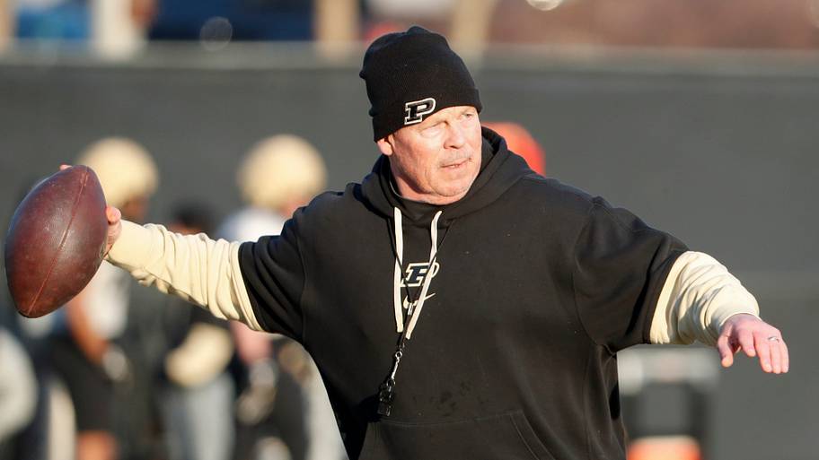 Purdue Boilermakers special teams coordinator James Shibest throws the ball.