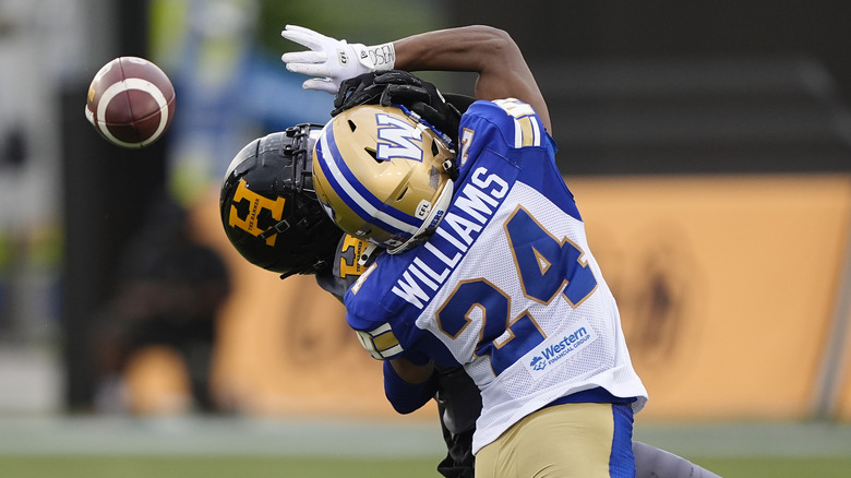 Sports photograph of an American football game.