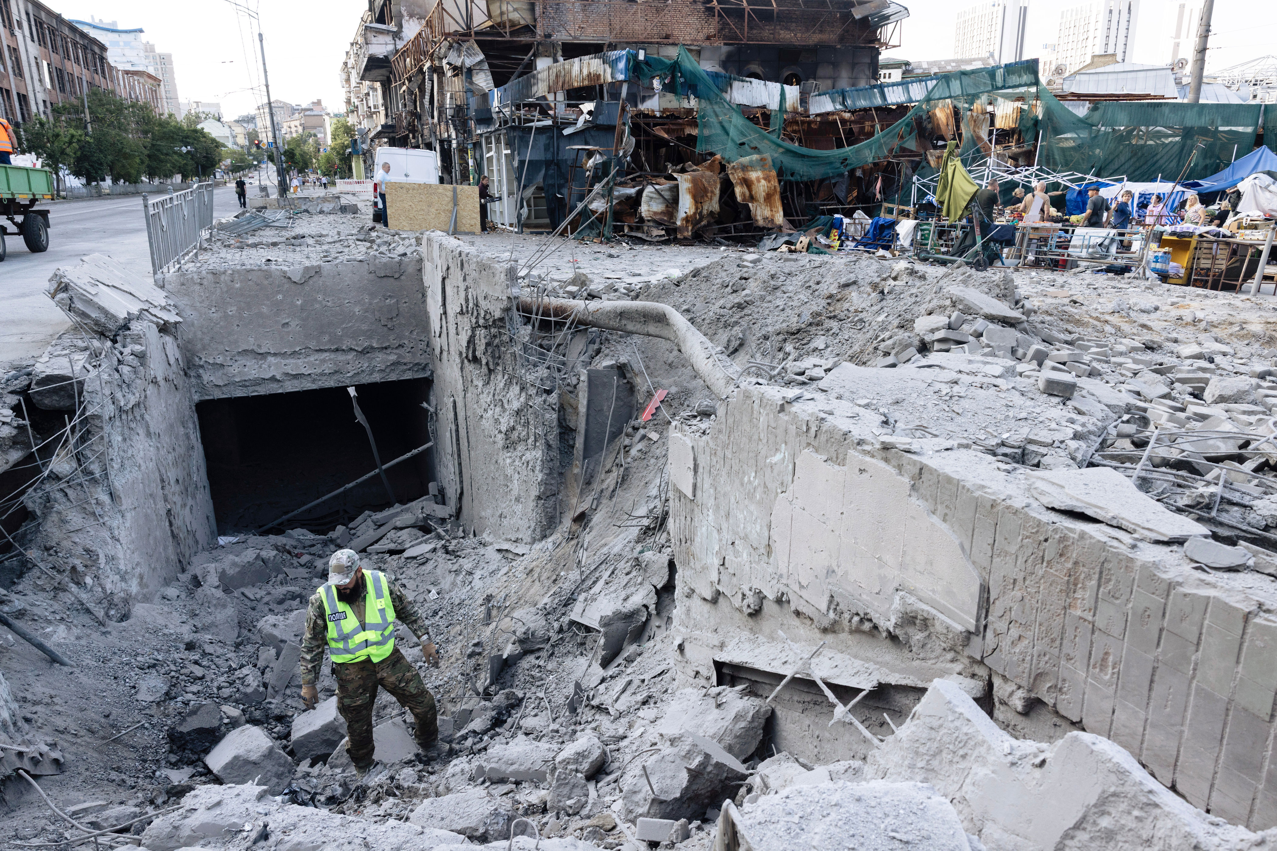 A weapons officer checks the missile parts at the metro station after a large-scale attack overnight (Getty)