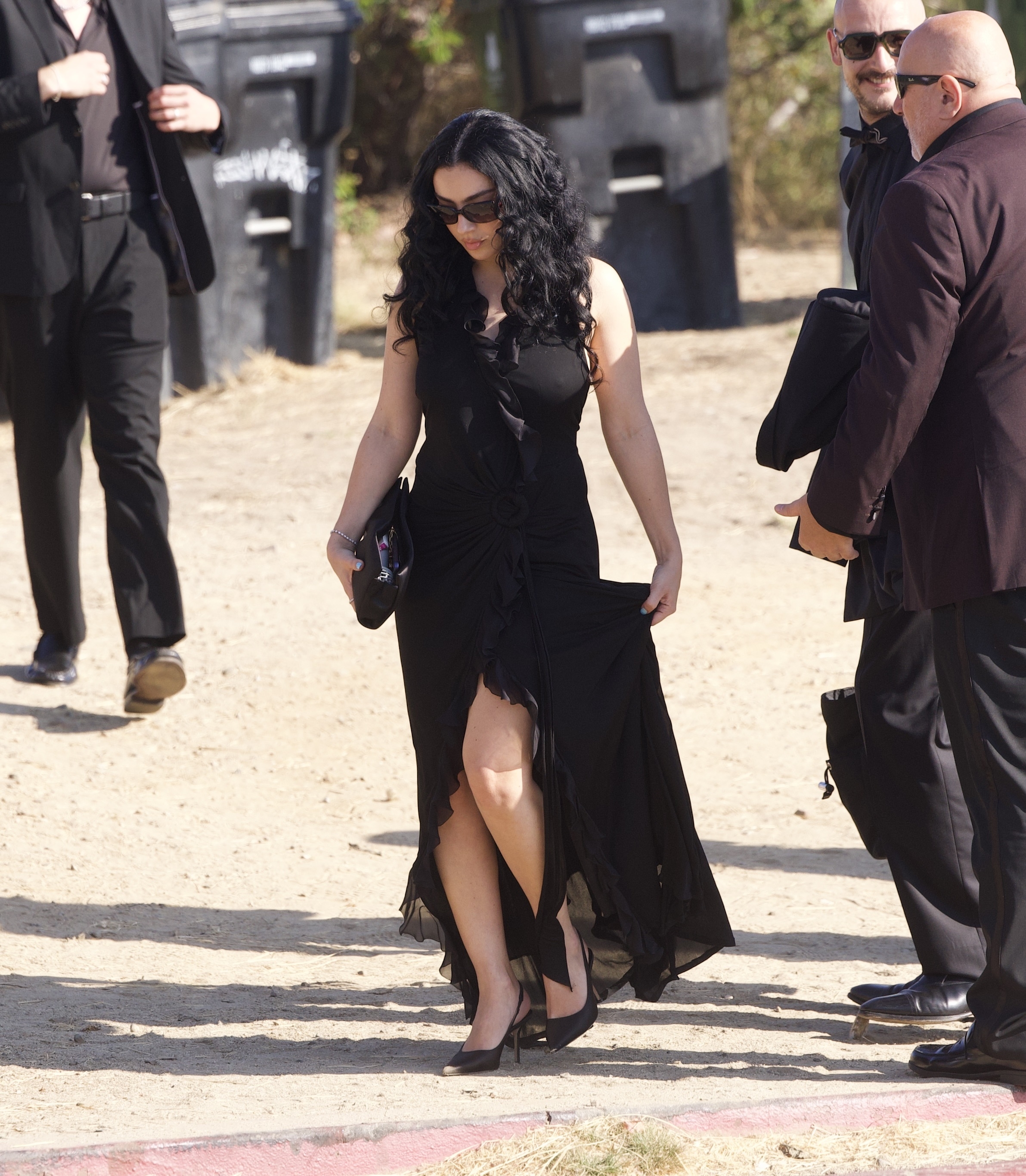 Charli XCX wears a little black dress to attend Matty Healy and fiancée Gabbriette Bechtel's wedding in Los Angeles