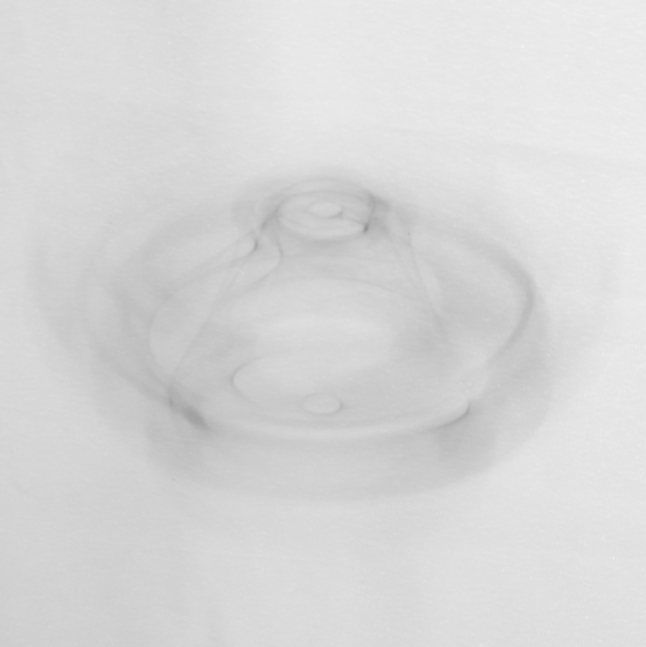 Spinning drone shown at a 60-degree angle on a white background. (CREDIT: Northwestern University)