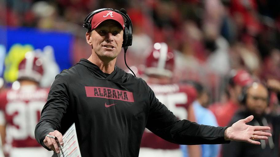 Alabama head coach Kalen DeBoer gestures on the sidelines after a dropped pass.