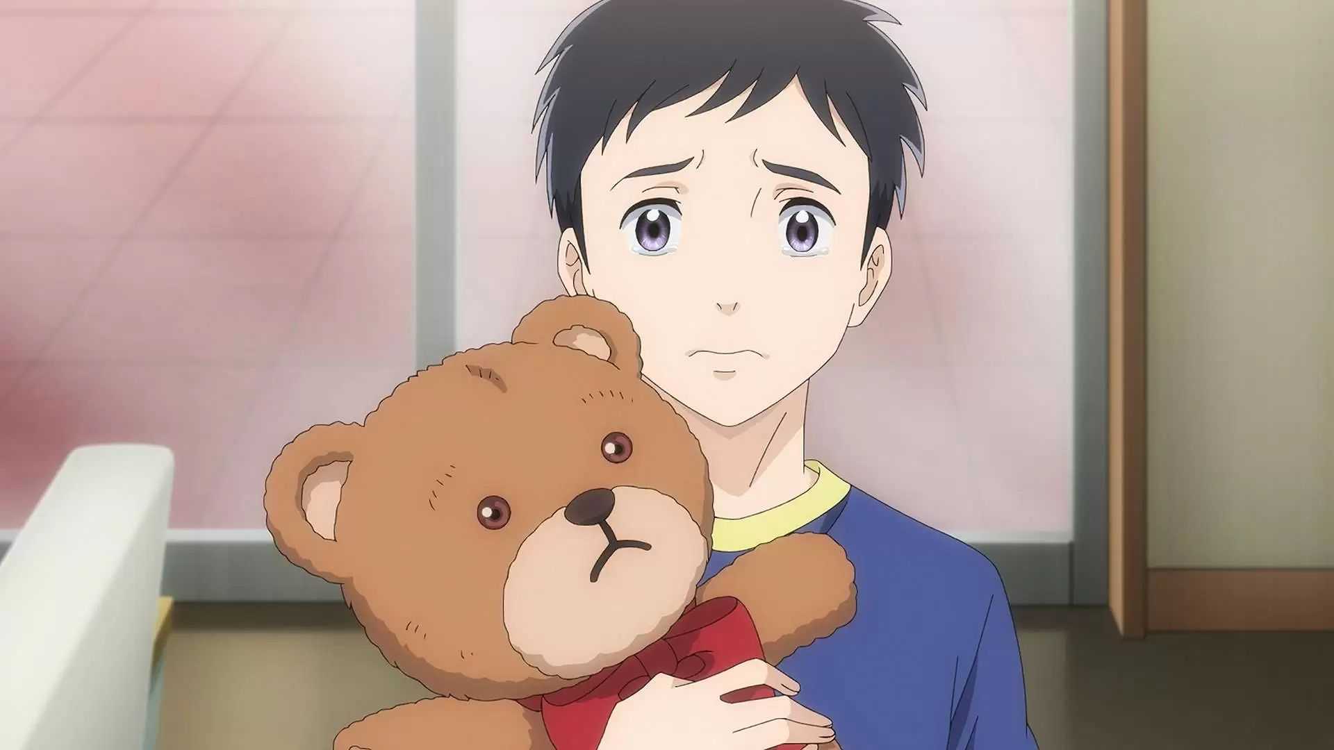 Little boy from The Gene of AI holding a teddy bear.