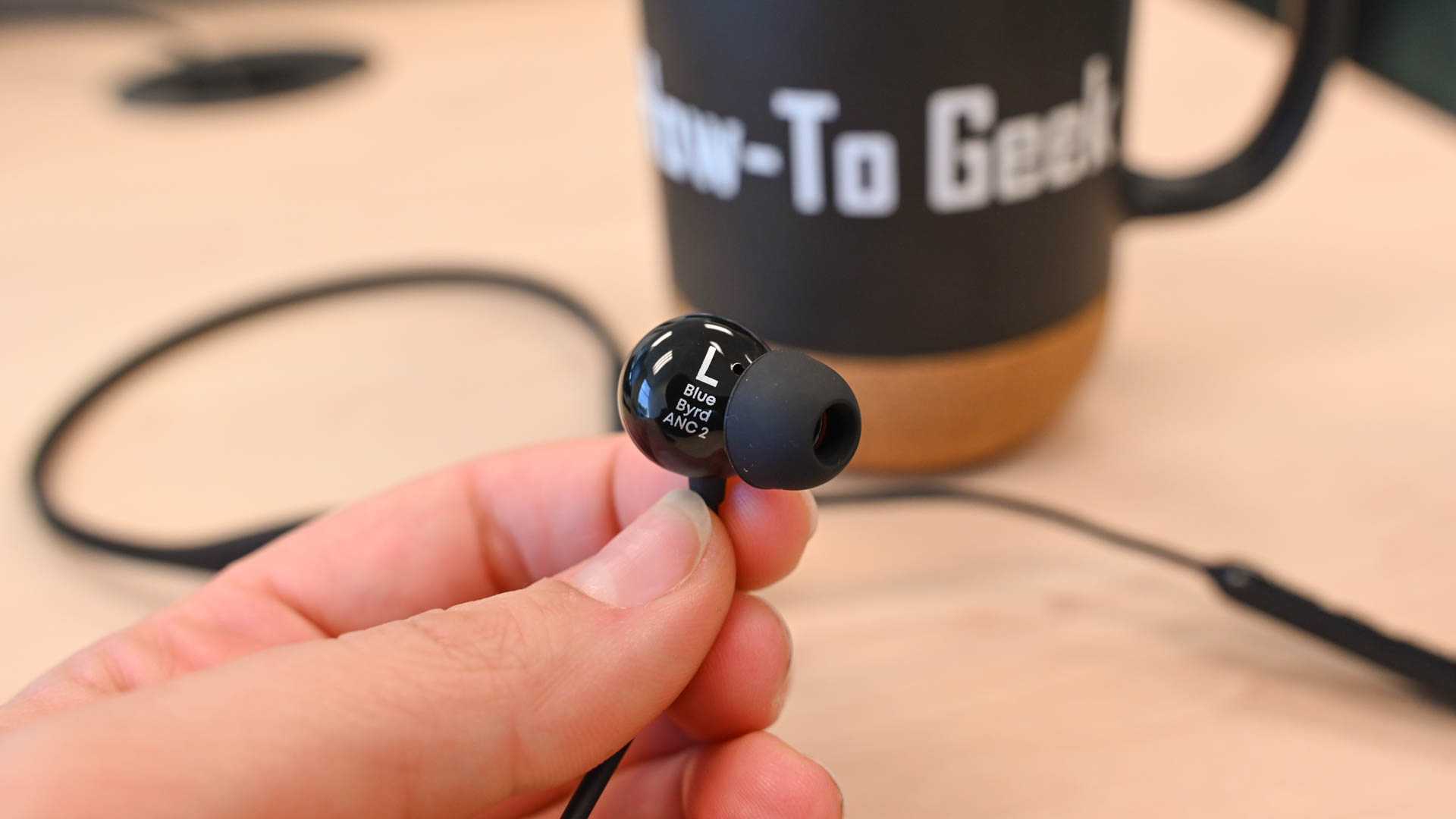 Person holding up the inside of the Beyerdynamic Blue BYRD ANC 2 earbud