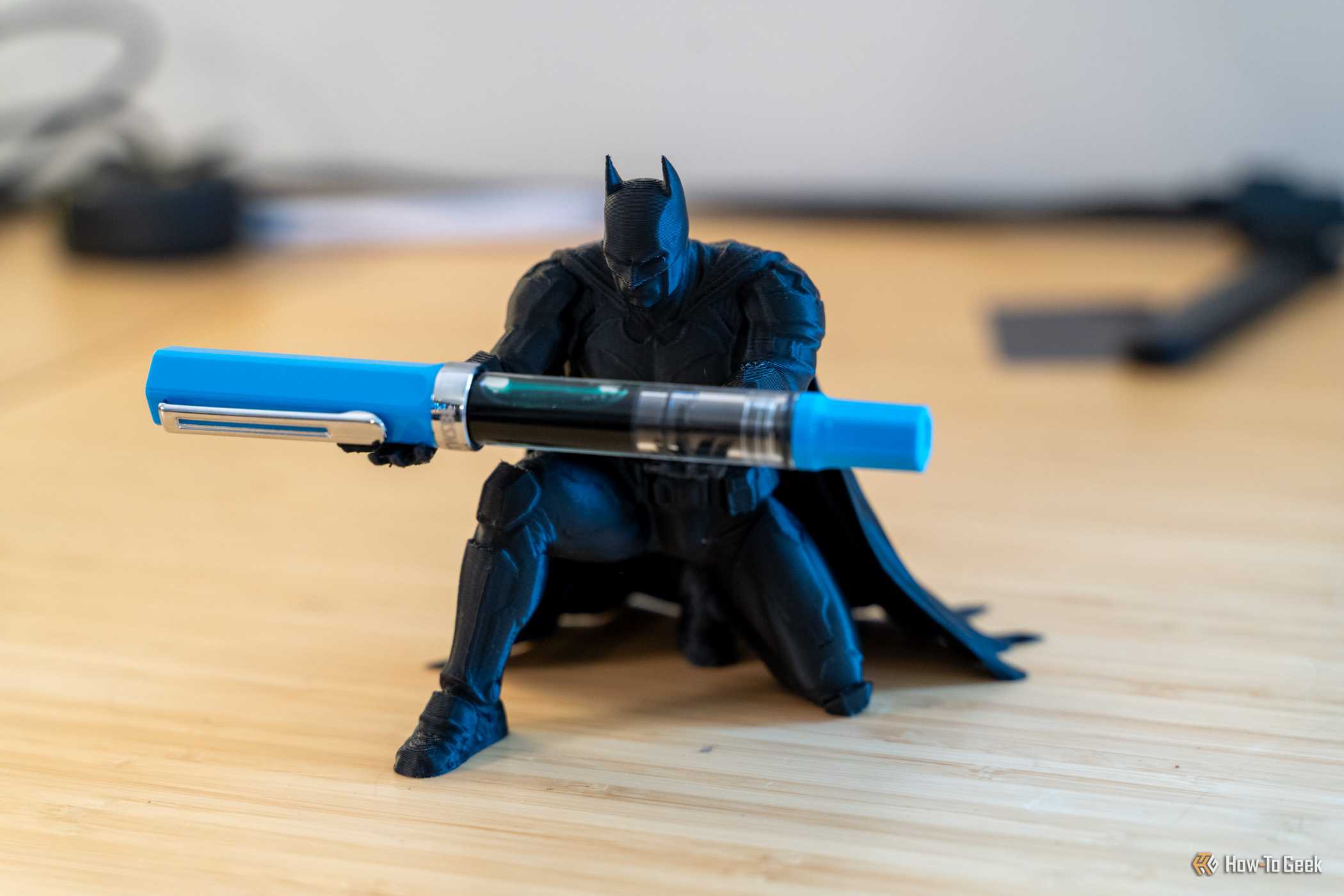 Elegoo Centauri 2 finished Batman pen holder holding fountain pen.