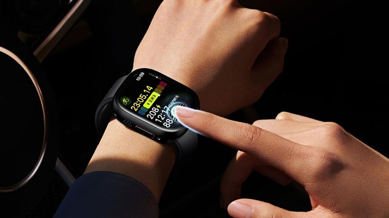Woman tapping an Apple Watch screen.