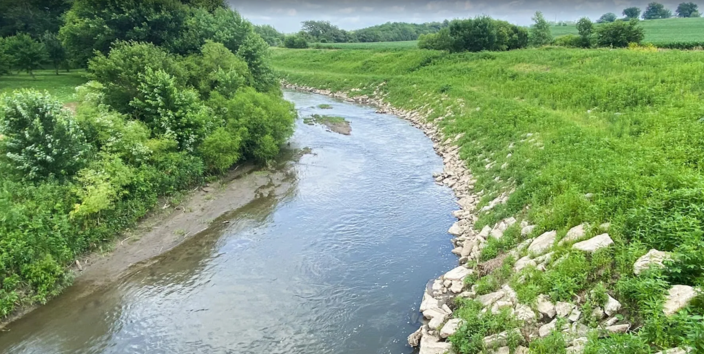 The T-bone Trail in rural area has an unusual hiking trail name and features 21 miles of paved path along a river.