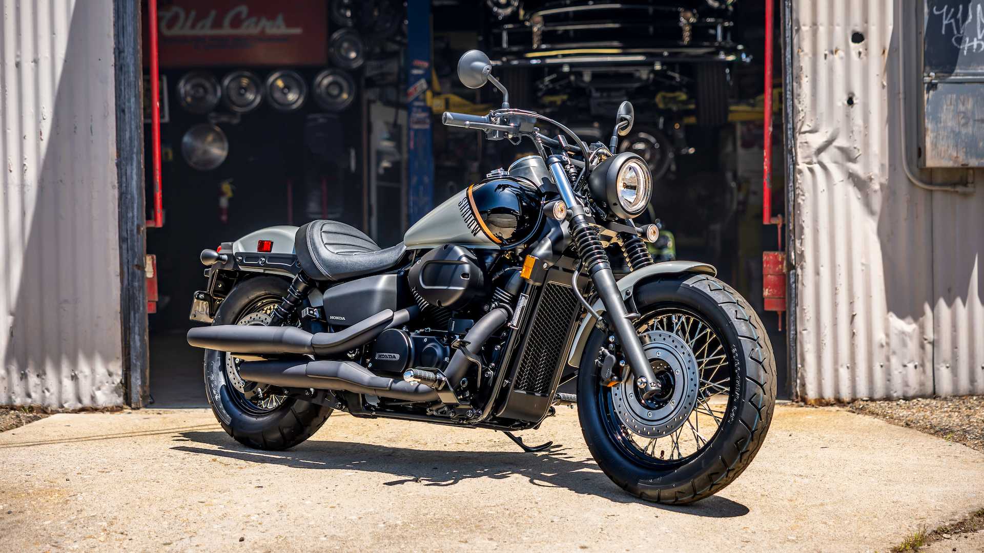 Honda Shadow Phantom parked outside a workshop