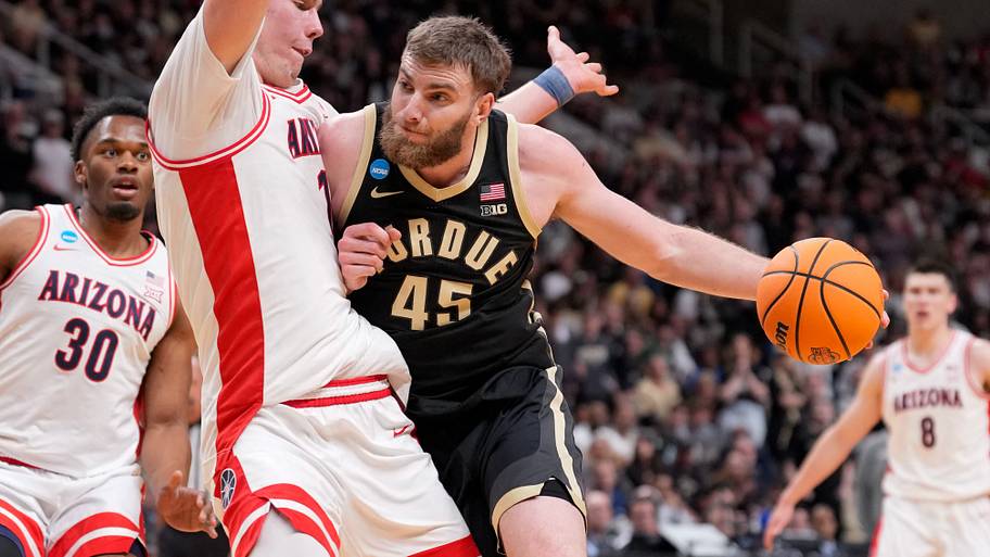 Purdue Boilermakers center Oscar Cluff (45) drives to the basket.