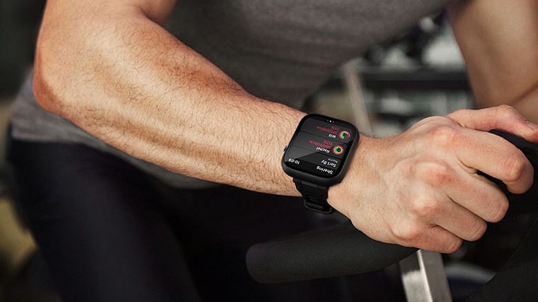 Man exercising while wearing an Apple Watch.