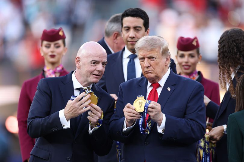FIFA President Gianni Infantino and U.S. President Donald Trump show off the winner's medals after the FIFA World Cup 2026 Final match between Spain and Argentina at New York New Jersey Stadium on July 19, 2026, in East Rutherford, New Jersey.