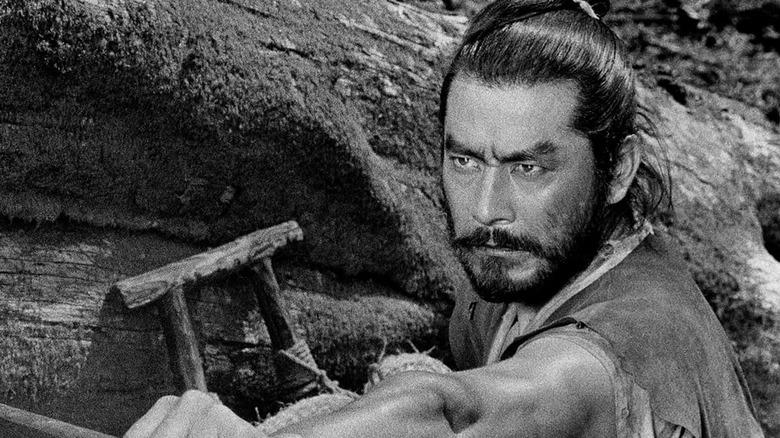 Musashi Miyamoto extending a stick in Samurai I: Musashi Miyamoto