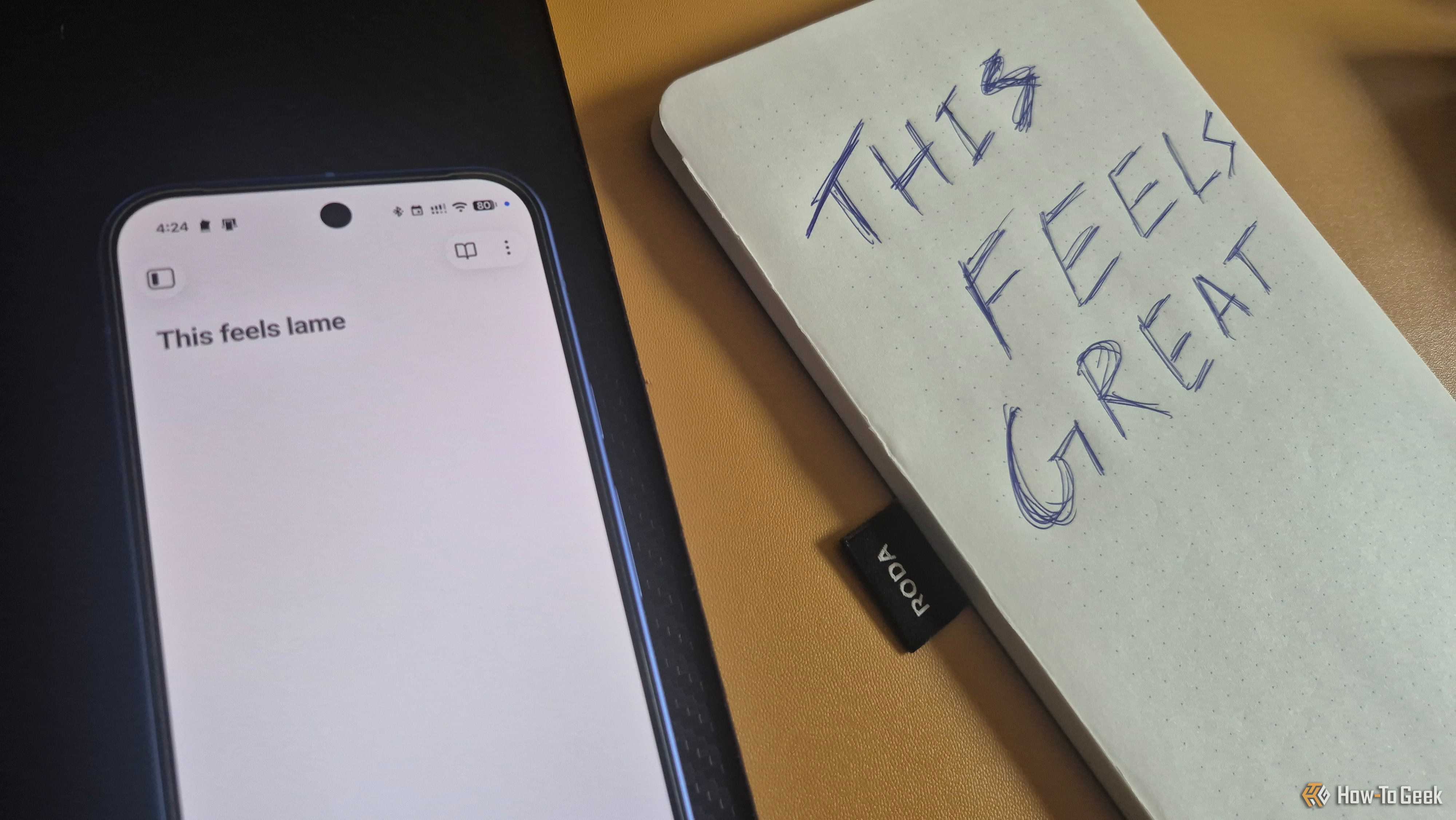 Phone screen reading This feels lame next to a notepad page handwritten This feels great, comparing digital and paper capture.