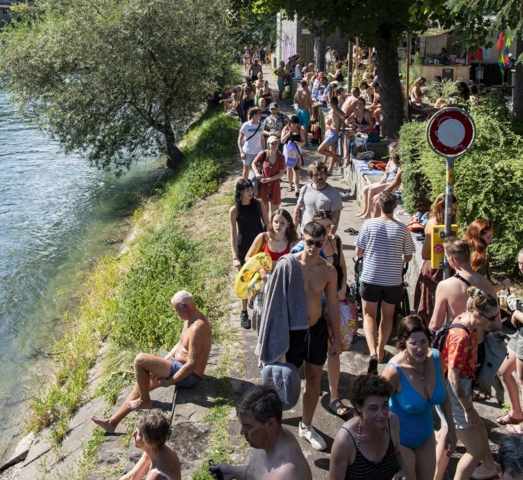Summer crowds along the river (Photo: Joel Carillet/Getty/iStock Unreleased)