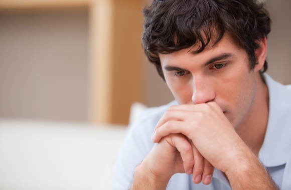 Student looks down / ESB Professional, Shutterstock