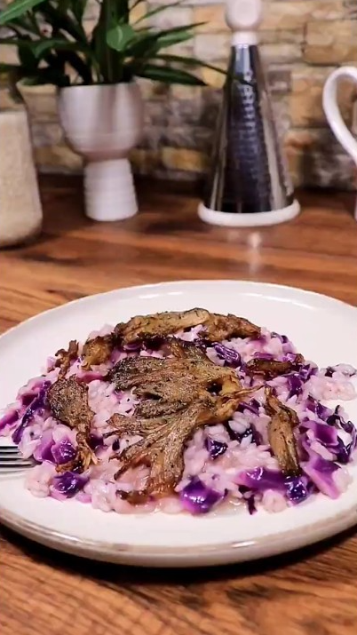Creamy risotto with purple cabbage and pleurotus mushrooms