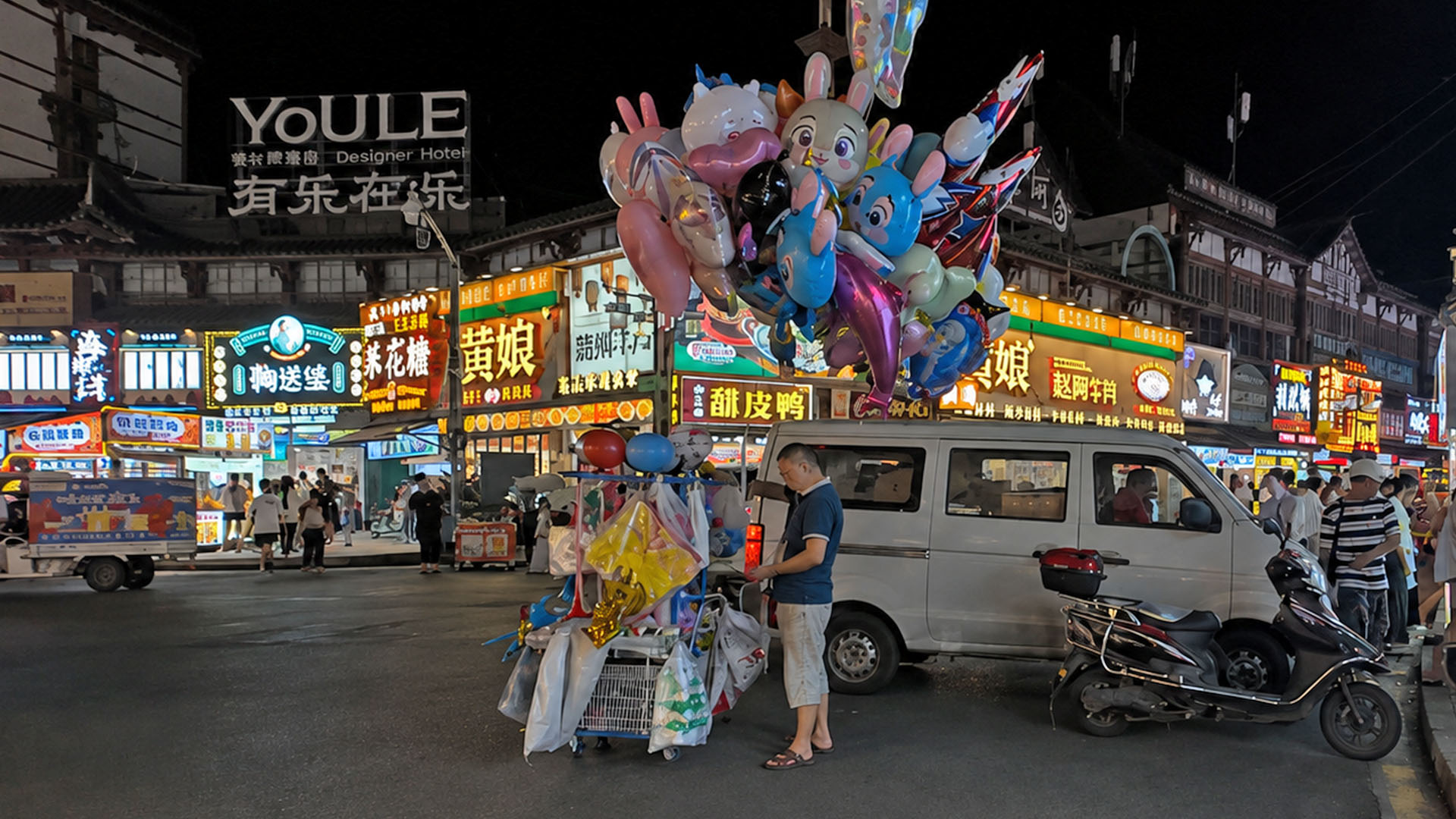 Walking around a Chinese night market after sunset