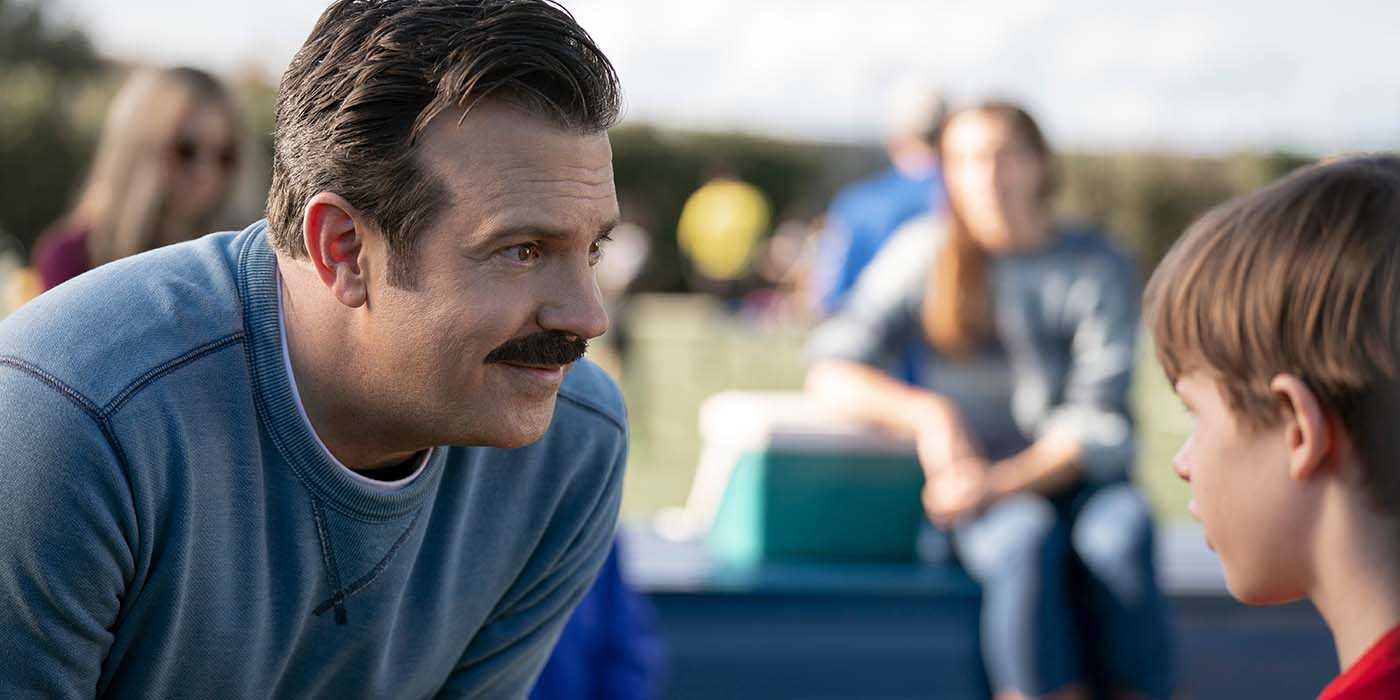 Ted gives his son Henry a pep talk at his soccer game in Ted Lasso's Season 3 finale.