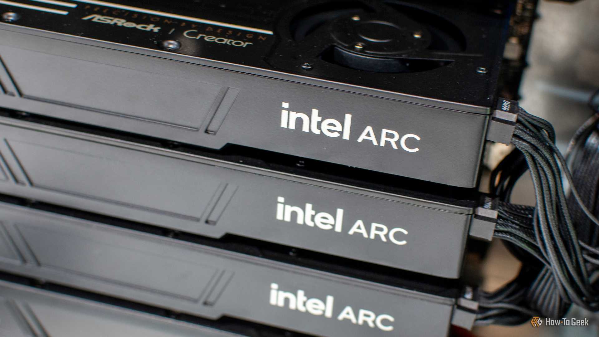 Closeup of several Intel Arc GPUs stacked on one another
