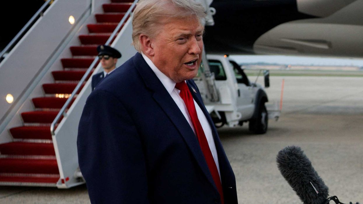 U.S. President Donald Trump speaks with the media as he arrives at Joint Base Andrews in Maryland, U.S., July 19, 2026. REUTERS/Evan Vucci