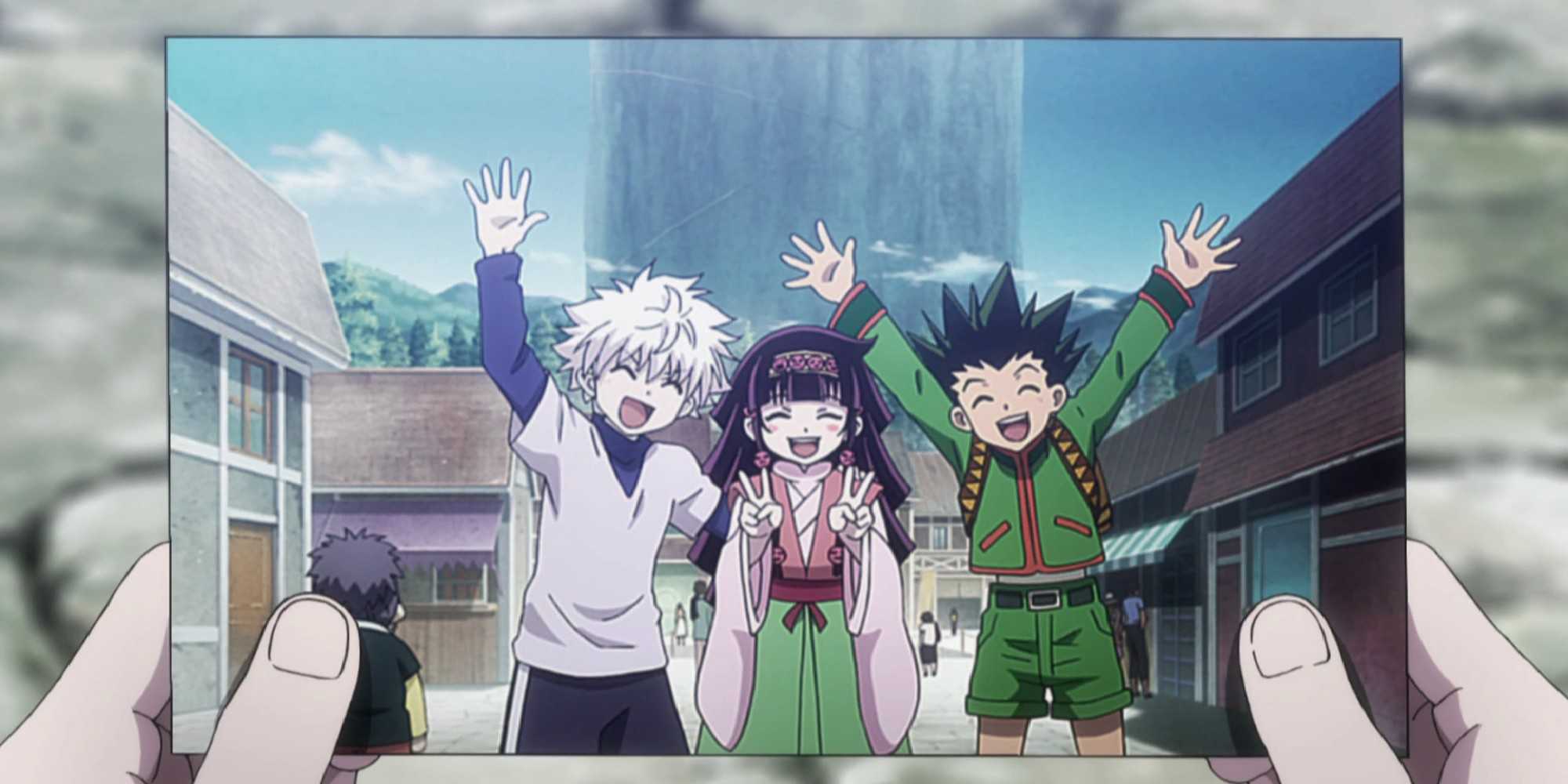 Gon, Killua and Alluka posing for a group picture
