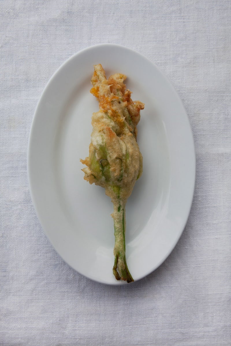 A Roman classic with molten mozzarella, salty anchovy and a crisp, airy shell (Supplied)