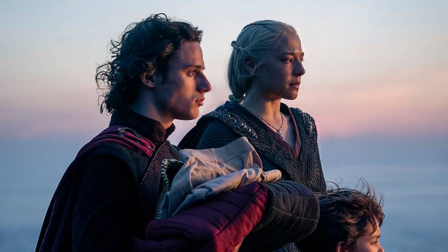 Jace, Rhaenyra, and Joffrey at Lucerys' funeral pyre.