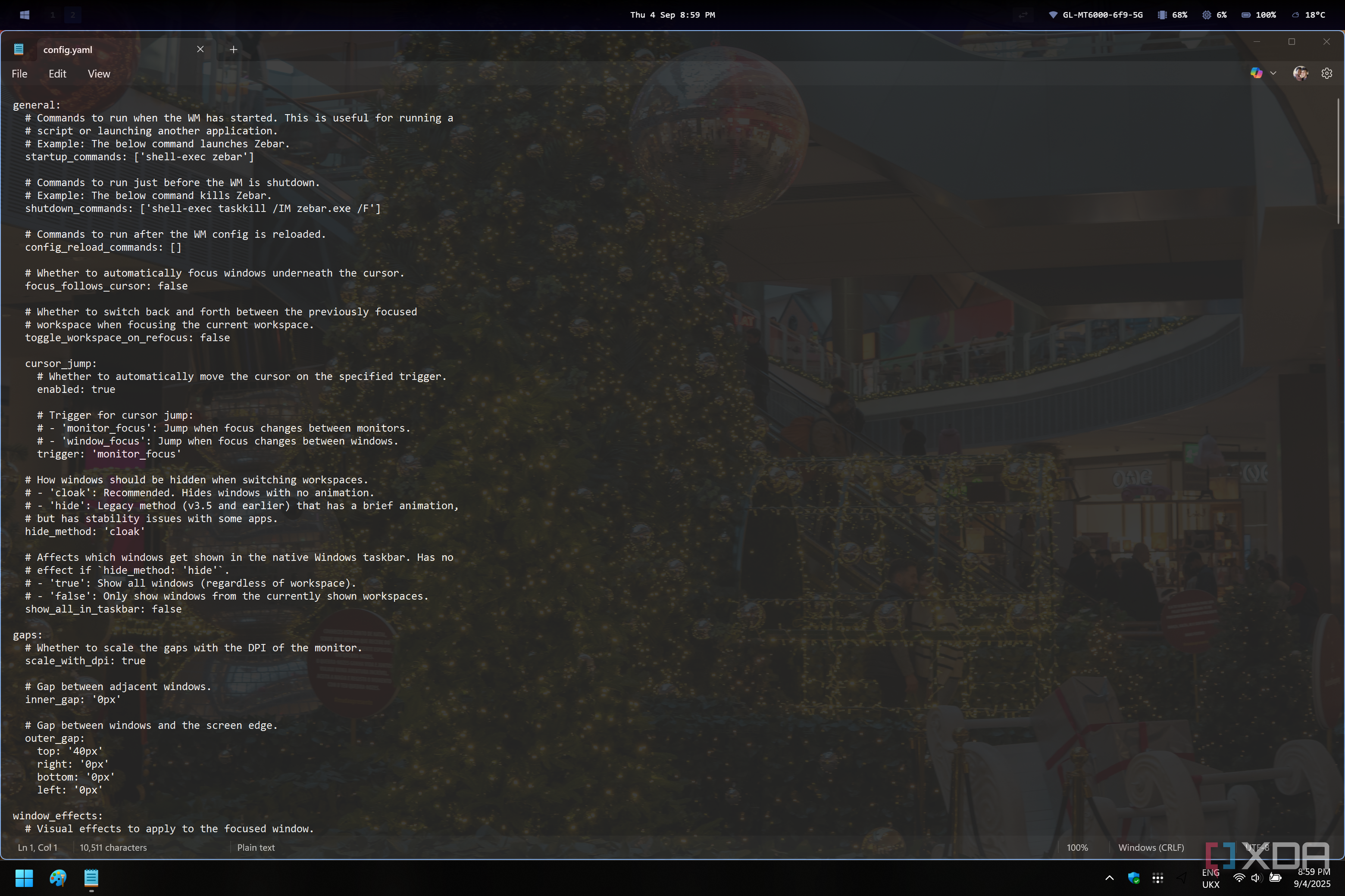 Screenshot of the configuration file for GlazeWM open in Notepad on Windows 11