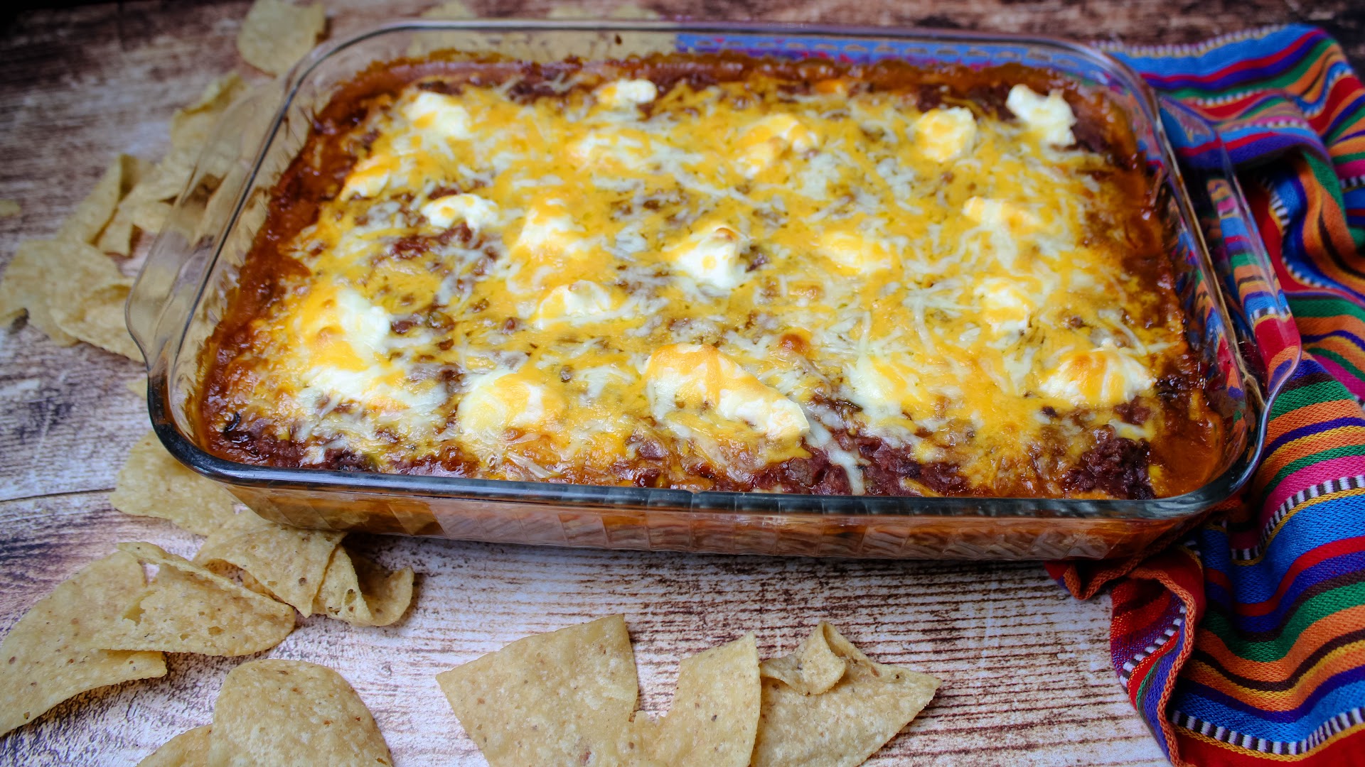A wonderful, hearty chili dip that's full of flavor - Mexican lasagna chip dip