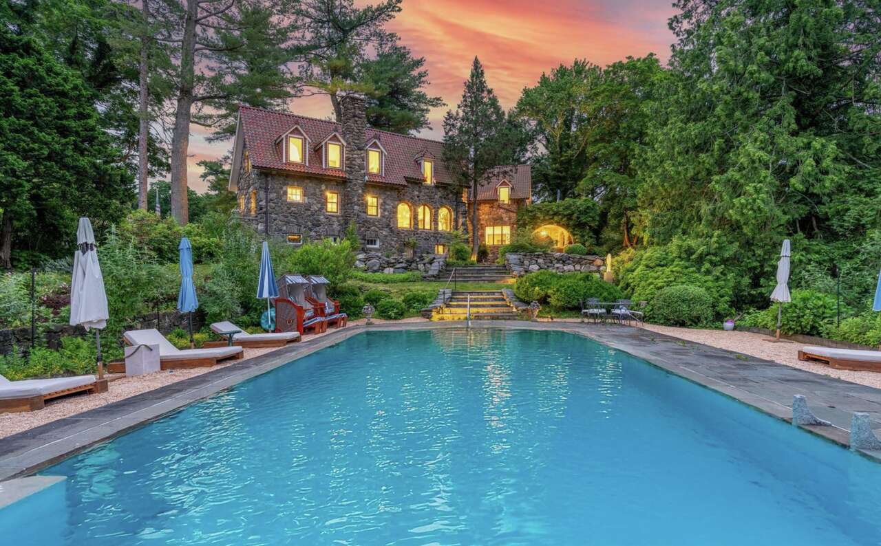 Century-old Greenwich 'castle' estate with waterfalls and pool lists for $7.995 million