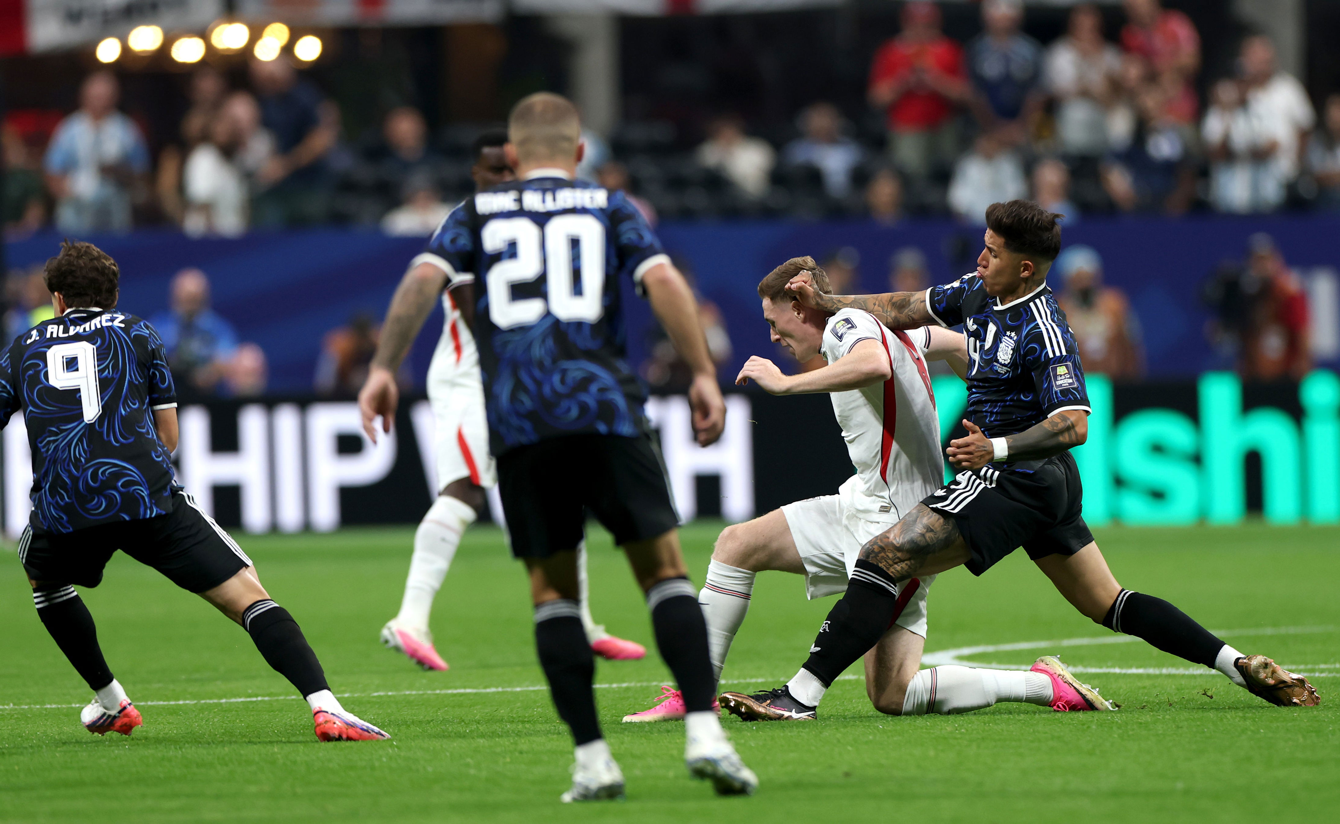 Elliot Anderson #8 of England is challenged by Enzo Fernandez #24 of Argentina (Getty)