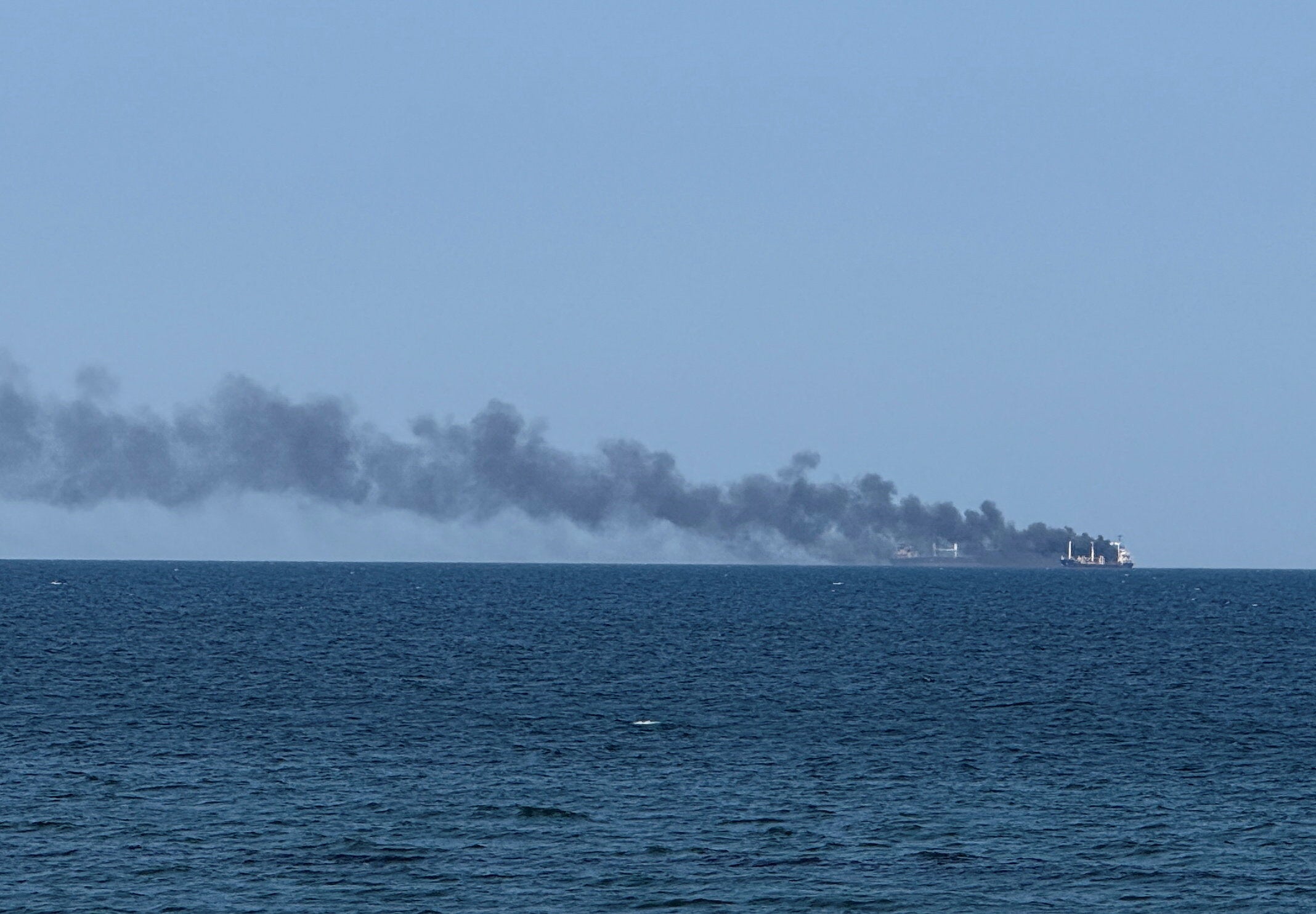 Smoke rises from a civilian vessel on fire, amid Russia's attack on Ukraine, in Odesa, Ukraine July 19, 2026. (Reuters)
