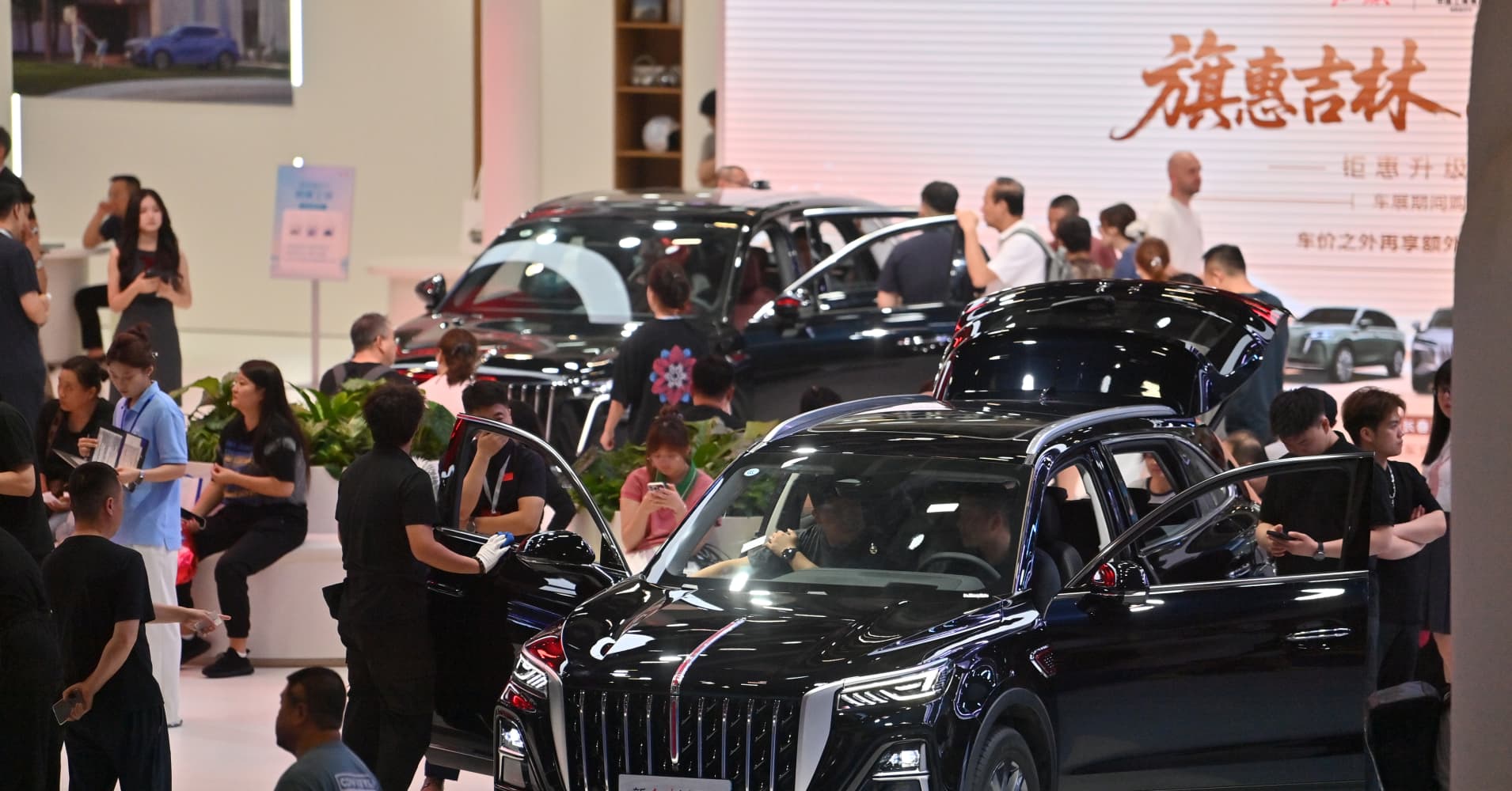 CHANGCHUN, CHINA - JULY 11: People visit the 23rd Changchun International Automobile Expo on July 11, 2026 in Changchun, Jilin Province of China. The exhibition drew participation from 53 Chinese and foreign automobile manufacturers, with over a thousand vehicles on display. (Photo by Zhang Yao/China News Service/VCG via Getty Images)