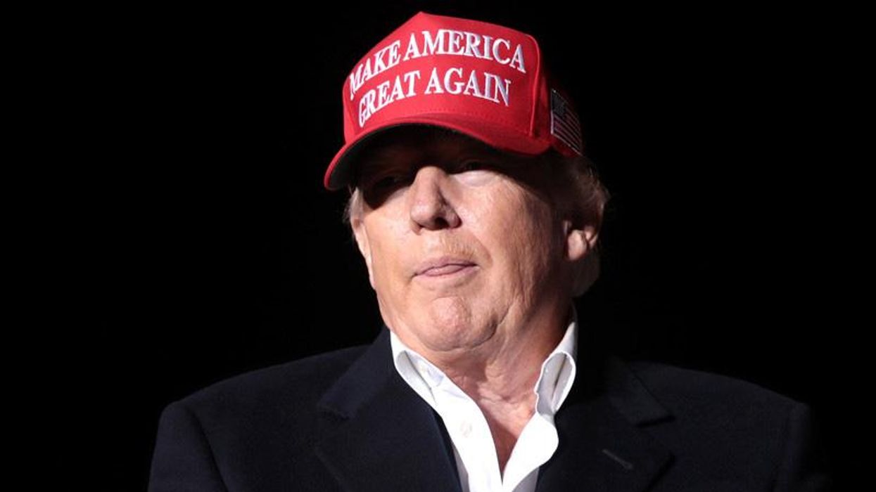 Donald Trump speaking with supporters at a