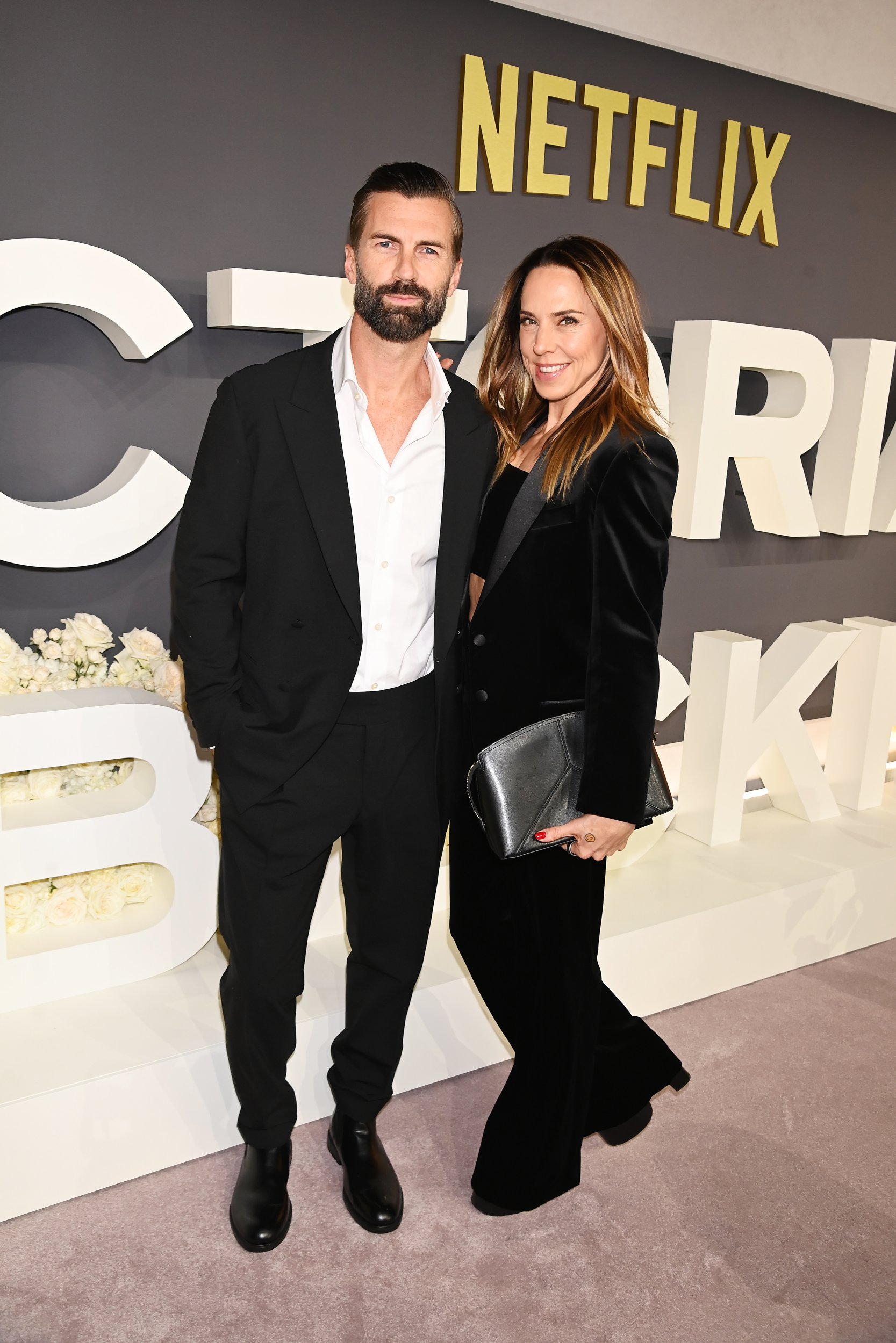 Chris Dingwall and Melanie C aka Sporty Spice attend the World Premiere of Victoria Beckham at The Curzon Mayfair on October 8, 2025