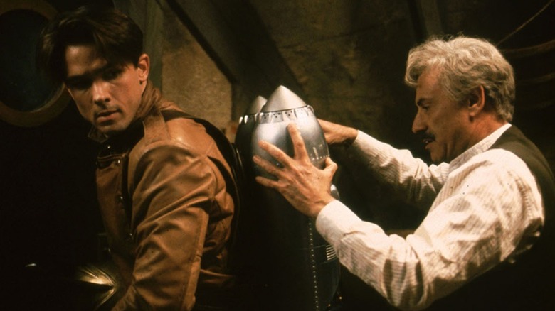 Clifford "Cliff" Secord getting suited up as The Rocketeer in The Rocketeer (1991)