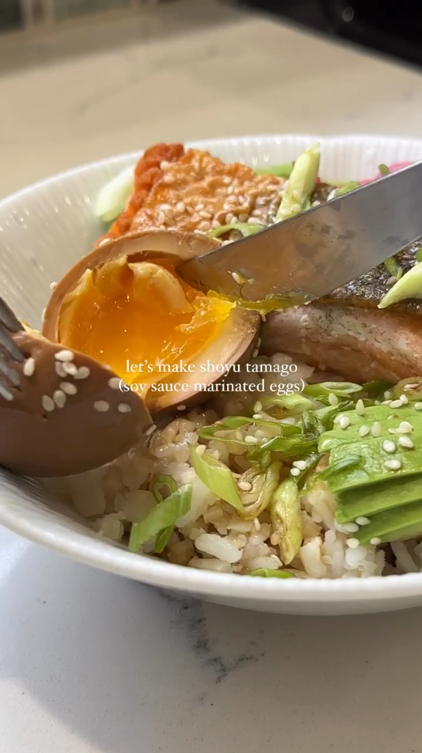 Soy sauce eggs with salmon rice bowl