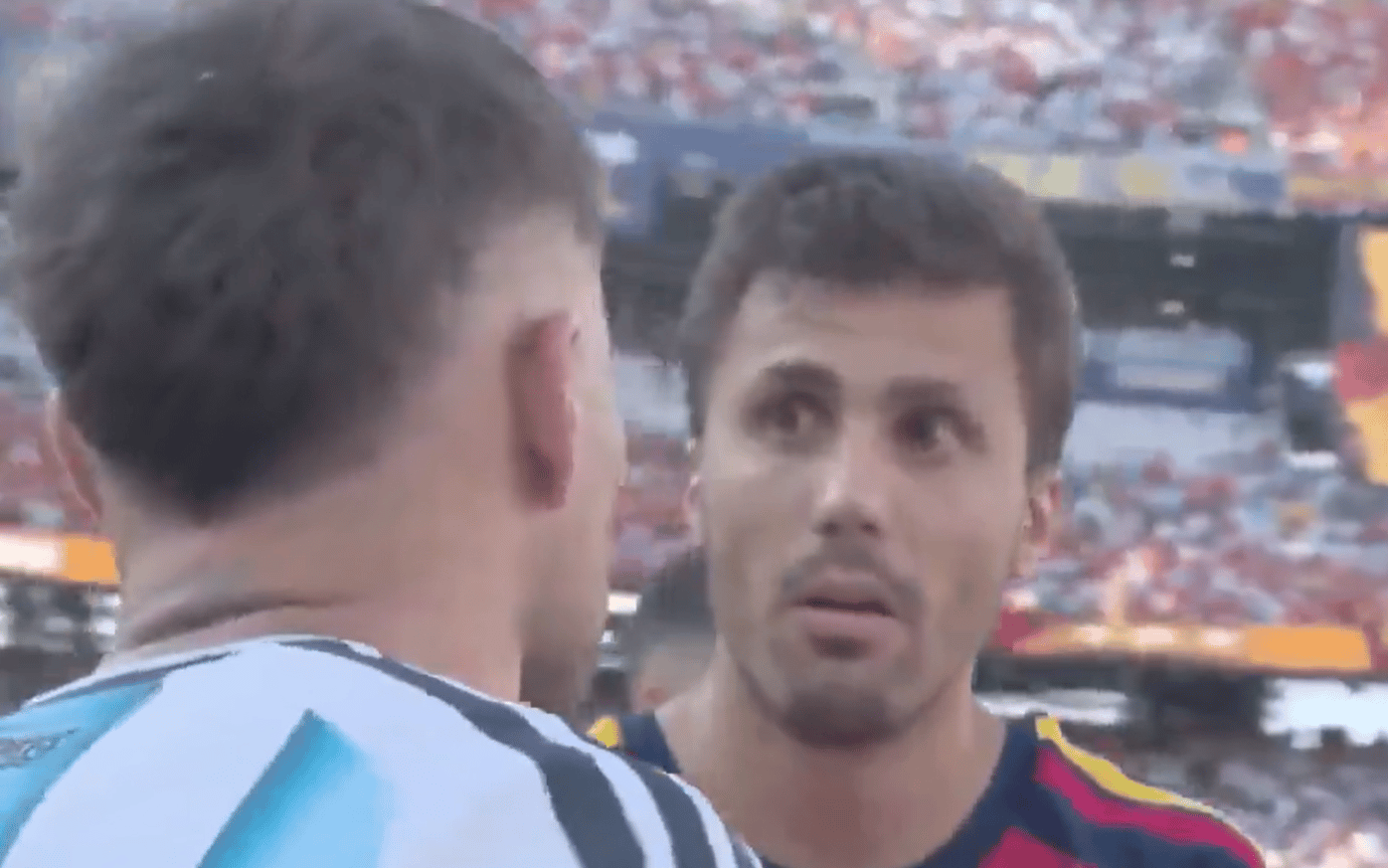 Rodri seemed taken aback by Nicolas Otamendi’s tirade (X/DAZN)