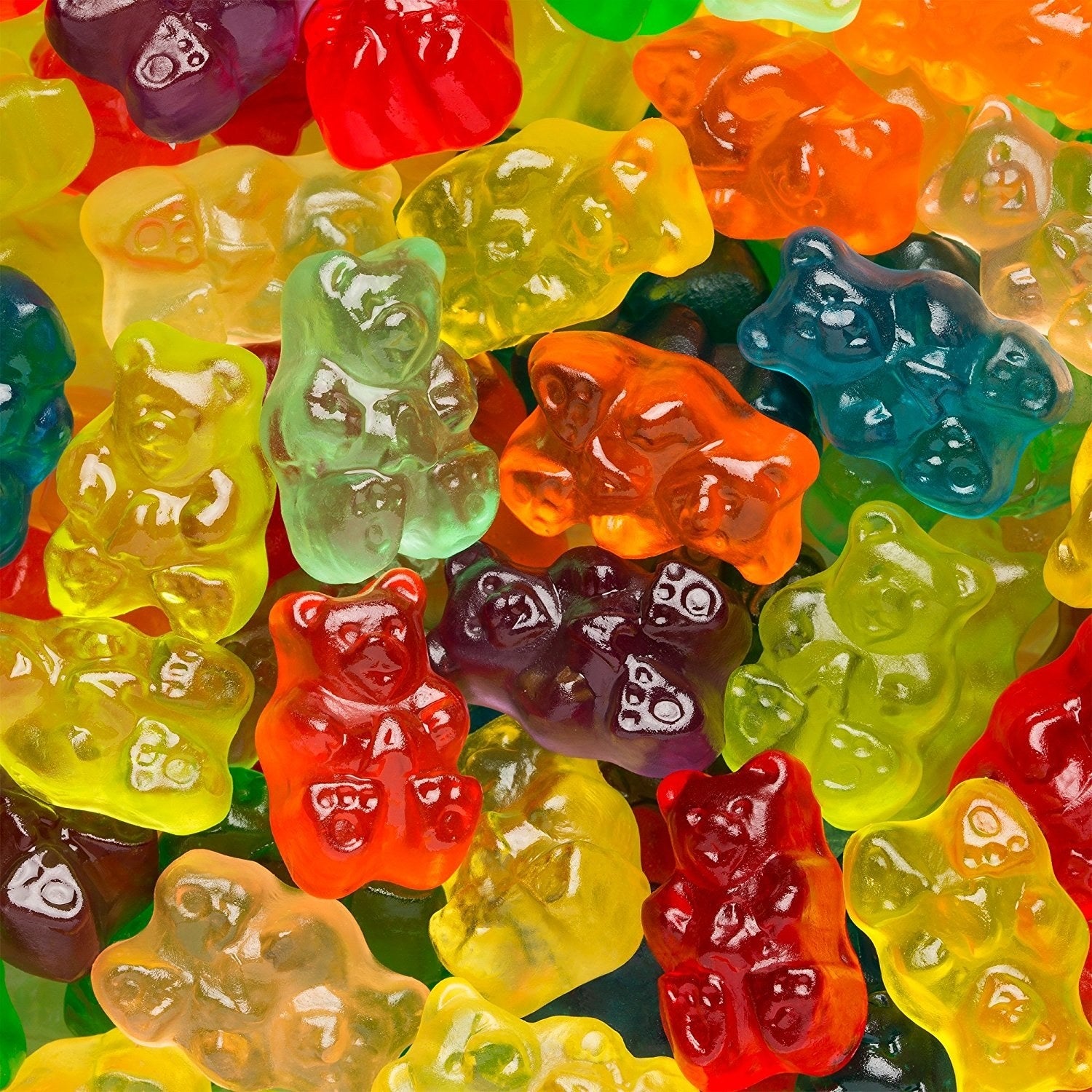 A close-up view of assorted gummy bears in different flavors and shapes for a candy shopping article