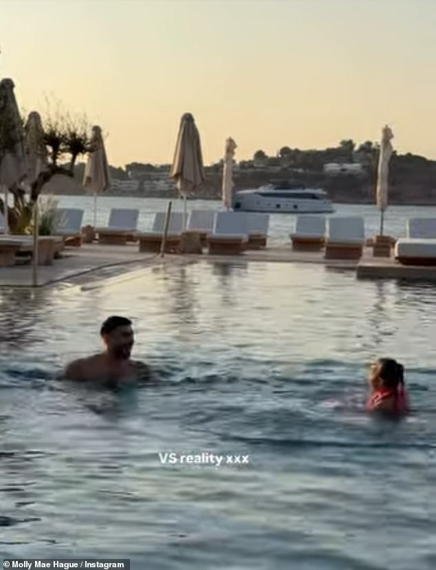 Despite the luxury of their five star stay, Molly-Mae shared a fun clip of Tommy playing with Bambi in the water while she tended to Midas, who was crying. She wrote: 'Insta VS reality'
