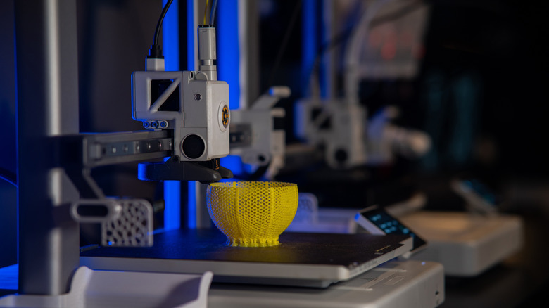 3D printer creating small bowl-shaped item
