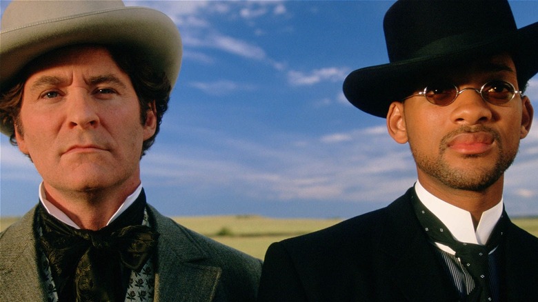 Capt. James West and U.S. Marshal Artemus Gordon standing togetherr in Wild Wild West (1999)