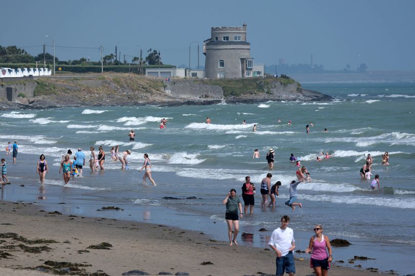 Beachgoers on Portmarnock Beach in Dublin