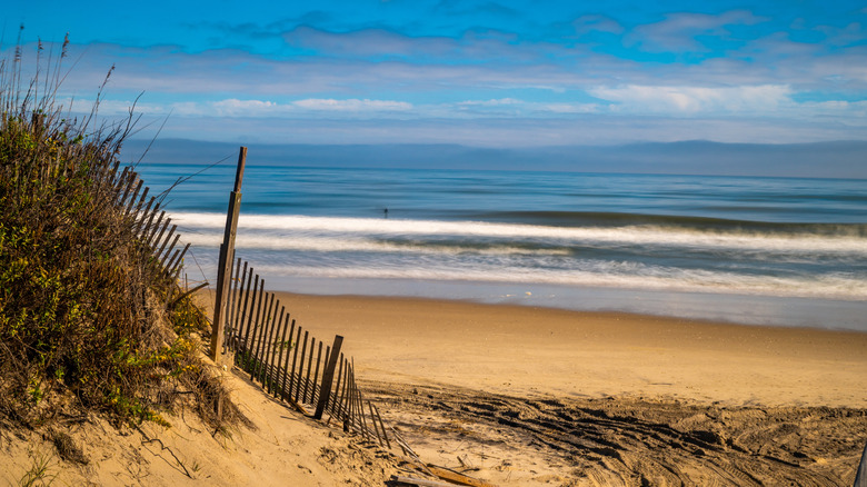 North Carolina's Untamed Beach Town Is Home To Roaming Mustangs, Rolling Dunes, And Quiet Sands